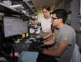 PhD Students Erik Barbosa and Madeline Morrell analyze water vapor storage and release in salts. Image credit: Allison Carter
