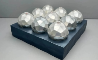 PES spheres are 30 times smaller than solar panels, with 7.5 times the output. Credit: WAVJA